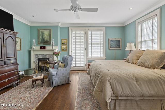 1616 Poplar Blvd, Jackson, MS 39202 - bedroom featuring a premium fireplace, wood finished floors, crown molding, recessed lighting, and ceiling fan