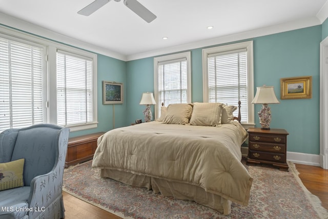 1616 Poplar Blvd, Jackson, MS 39202 - bedroom featuring multiple windows, wood finished floors, baseboards, recessed lighting, and a ceiling fan