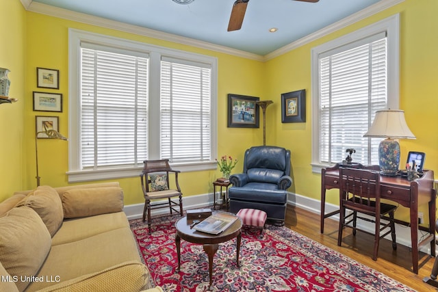 1616 Poplar Blvd, Jackson, MS 39202 - living room featuring healthy amount of natural light, wood finished floors, a ceiling fan, ornamental molding, and baseboards