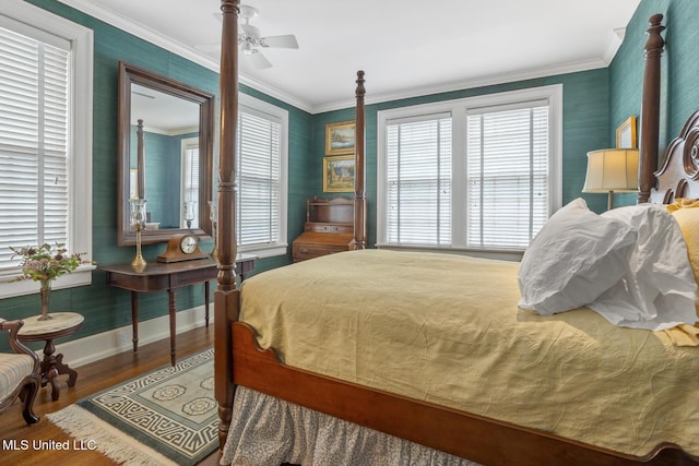 1616 Poplar Blvd, Jackson, MS 39202 - bedroom with baseboards, wood finished floors, crown molding, and ceiling fan
