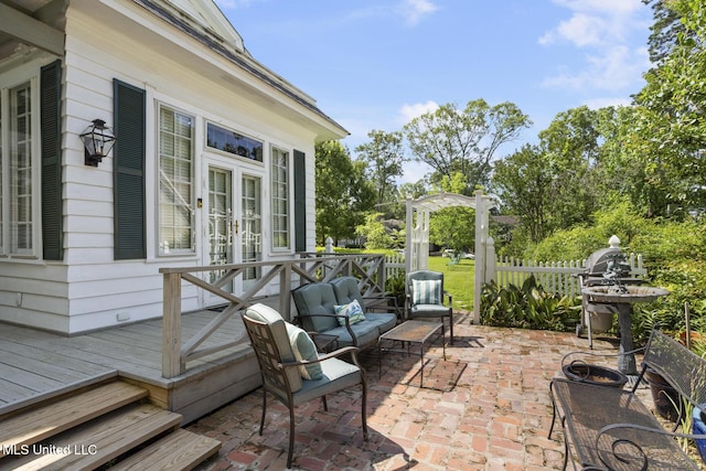1616 Poplar Blvd, Jackson, MS 39202 - view of patio with a wooden deck, french doors, and an outdoor hangout area