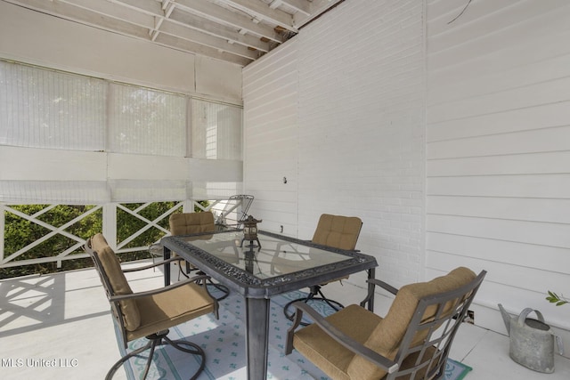 1616 Poplar Blvd, Jackson, MS 39202 - sunroom featuring outdoor dining space