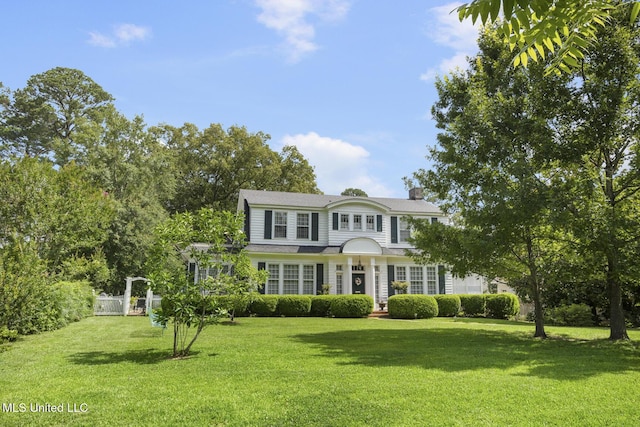 1616 Poplar Blvd, Jackson, MS 39202 - view of front of home featuring a front yard and a chimney
