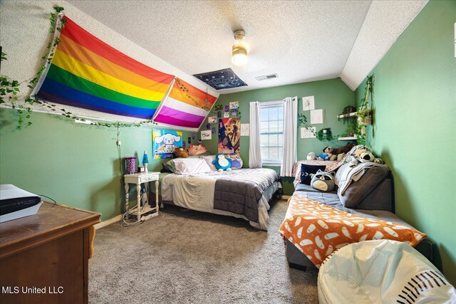 carpeted bedroom with lofted ceiling, a textured ceiling, visible vents, and a ceiling fan