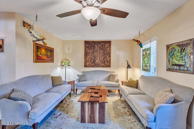 living room featuring ceiling fan