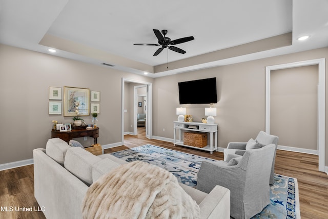 67 E Andover, Hattiesburg, MS 39402 - living area with a raised ceiling, recessed lighting, a ceiling fan, and wood finished floors