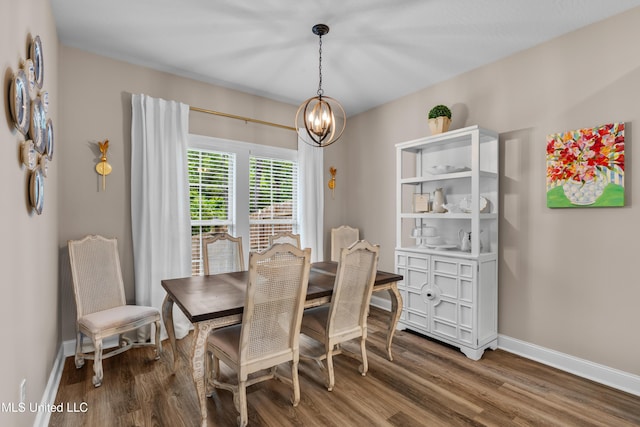 67 E Andover, Hattiesburg, MS 39402 - dining room with wood finished floors and a chandelier
