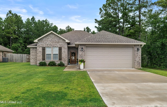 67 E Andover, Hattiesburg, MS 39402 - view of front of home featuring brick siding, an attached garage, roof with shingles, and driveway