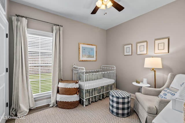 67 E Andover, Hattiesburg, MS 39402 - bedroom with a crib and ceiling fan