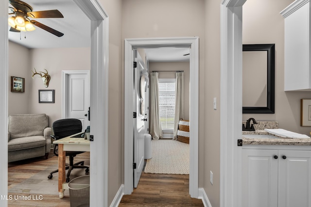 67 E Andover, Hattiesburg, MS 39402 - hallway featuring dark wood finished floors and an office area