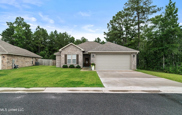 67 E Andover, Hattiesburg, MS 39402 - ranch-style house with an attached garage, driveway, brick siding, and a shingled roof