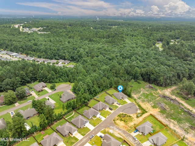 67 E Andover, Hattiesburg, MS 39402 - view of property location featuring a forest and nearby suburban area