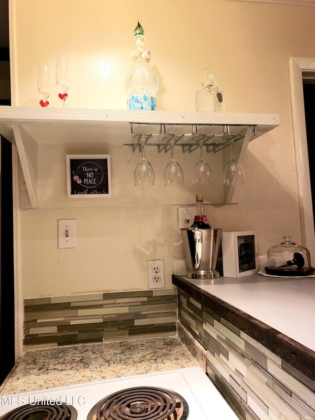 interior space with decorative backsplash