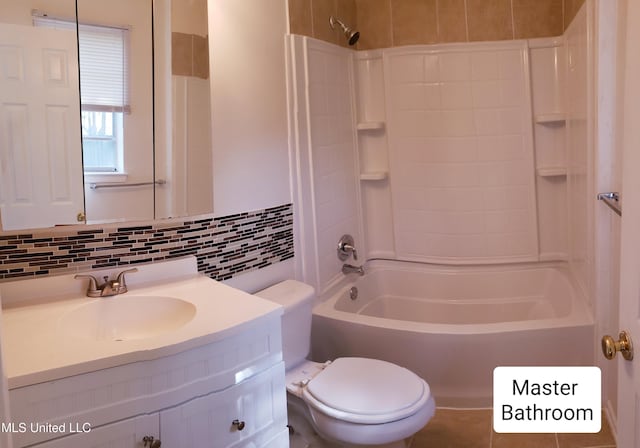 full bathroom with bathing tub / shower combination, decorative backsplash, vanity, and toilet