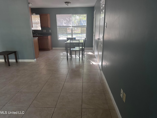 dining room with tile patterned floors