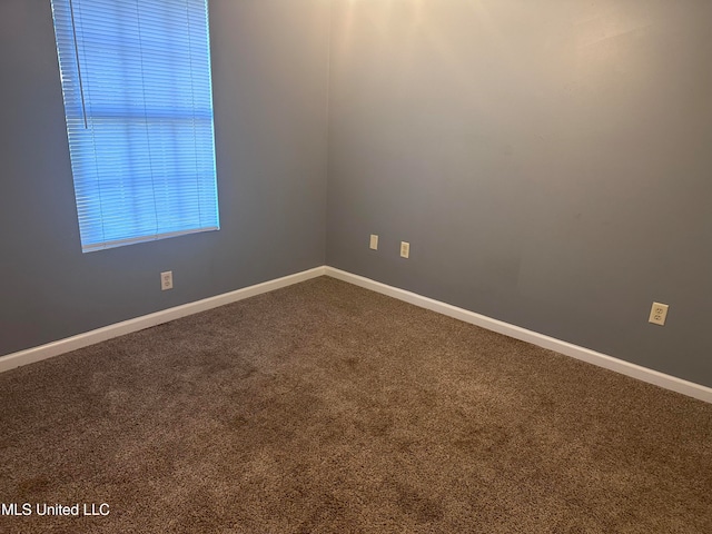 view of carpeted spare room