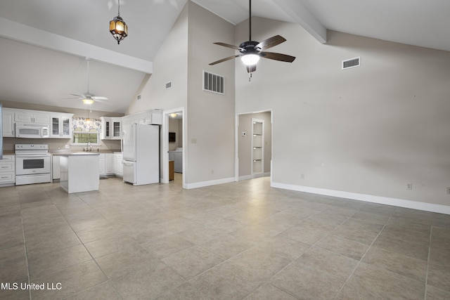 unfurnished living room with a ceiling fan, a sink, baseboards, and visible vents