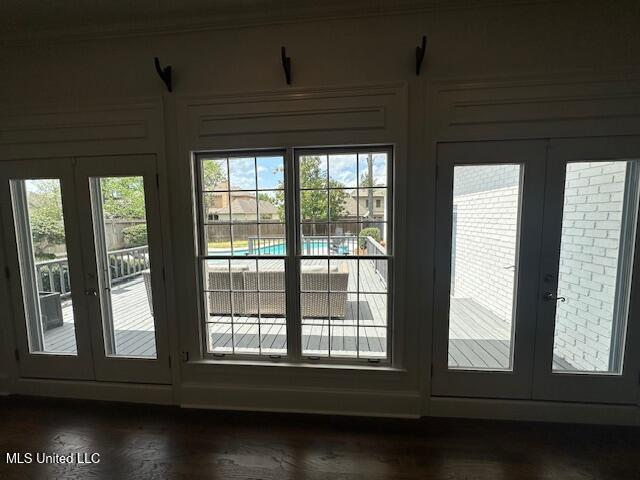 117 Peninsula Dr, Brandon, MS 39047 - doorway to outside featuring french doors, dark wood-style floors, and a wealth of natural light