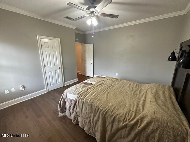 117 Peninsula Dr, Brandon, MS 39047 - bedroom featuring crown molding, baseboards, ceiling fan, and dark wood finished floors