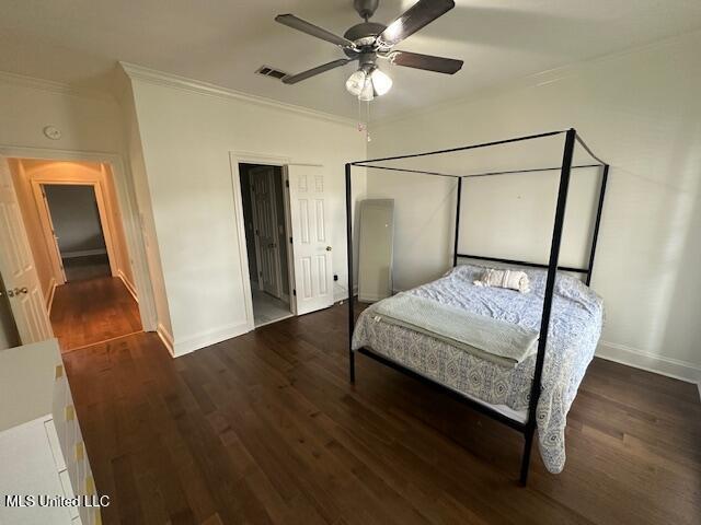 117 Peninsula Dr, Brandon, MS 39047 - bedroom with baseboards, visible vents, crown molding, and wood finished floors