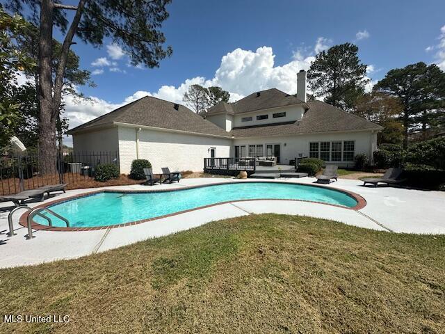 117 Peninsula Dr, Brandon, MS 39047 - view of pool featuring a yard, a fenced in pool, fence, and a patio