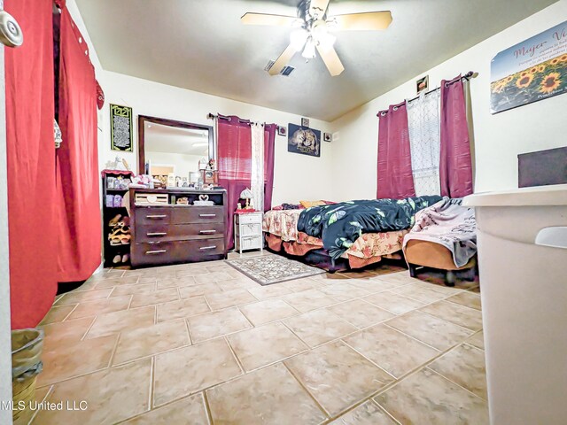 2220 18th Ave, Gulfport, MS 39501 - bedroom with tile patterned flooring and ceiling fan