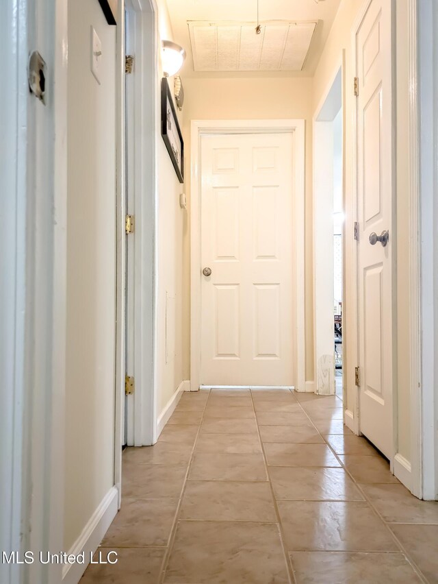 2220 18th Ave, Gulfport, MS 39501 - corridor featuring light tile patterned floors and baseboards