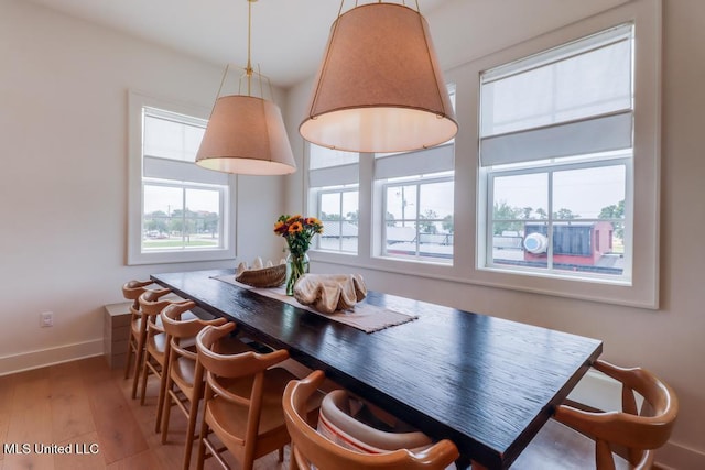 405 Mason Ave, Long Beach, MS 39560 - dining space with baseboards and wood finished floors