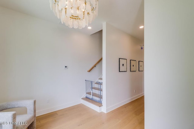 405 Mason Ave, Long Beach, MS 39560 - staircase with wood finished floors, a chandelier, and recessed lighting