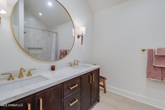 405 Mason Ave, Long Beach, MS 39560 - full bathroom featuring tile patterned flooring, double vanity, lofted ceiling, and curtained shower