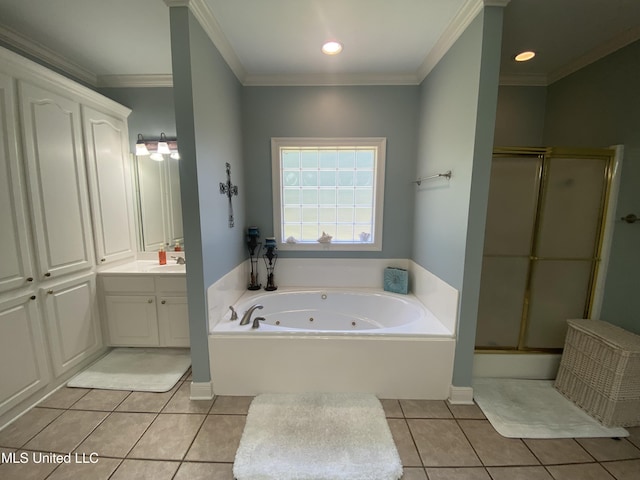 bathroom featuring ornamental molding, a whirlpool tub, a shower stall, vanity, and tile patterned flooring