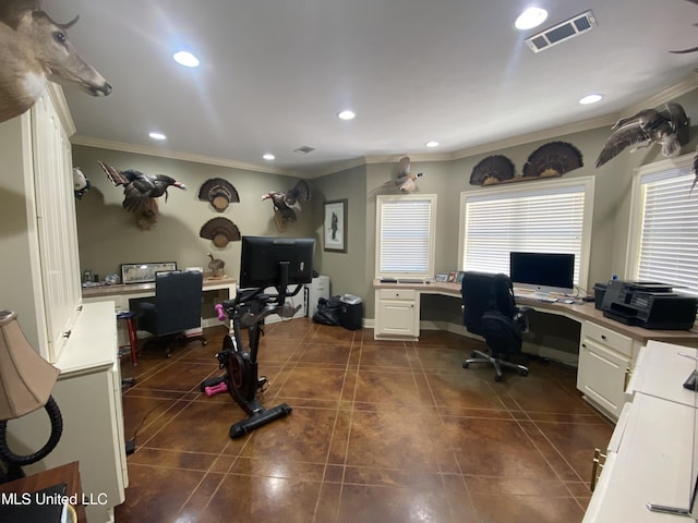 office space with a wealth of natural light, recessed lighting, visible vents, and crown molding