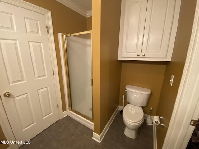 full bathroom with toilet, a stall shower, baseboards, and ornamental molding