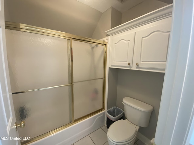 full bathroom with toilet, tile patterned floors, enclosed tub / shower combo, and lofted ceiling