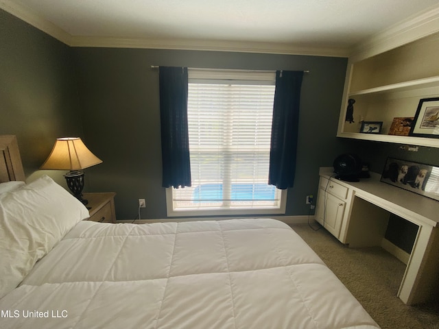 carpeted bedroom with crown molding and baseboards