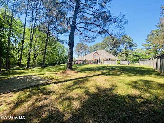view of yard with fence