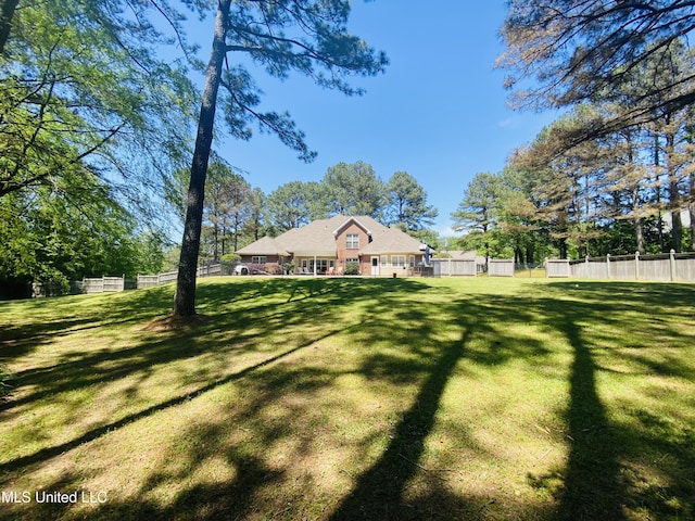 view of yard with fence