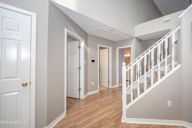 entryway with light hardwood / wood-style flooring