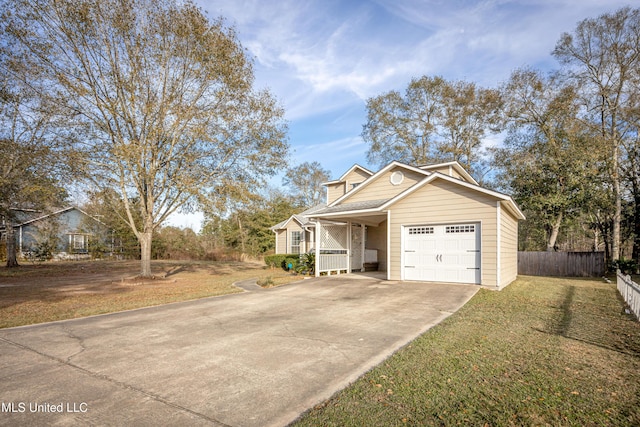 view of front facade featuring a garage and a front lawn