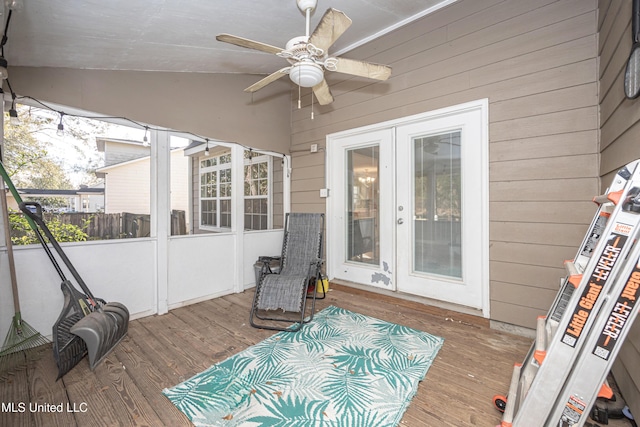 sunroom with ceiling fan and french doors