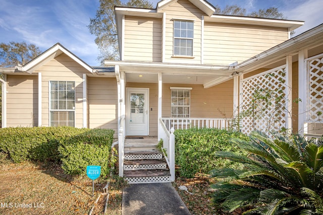 entrance to property with covered porch