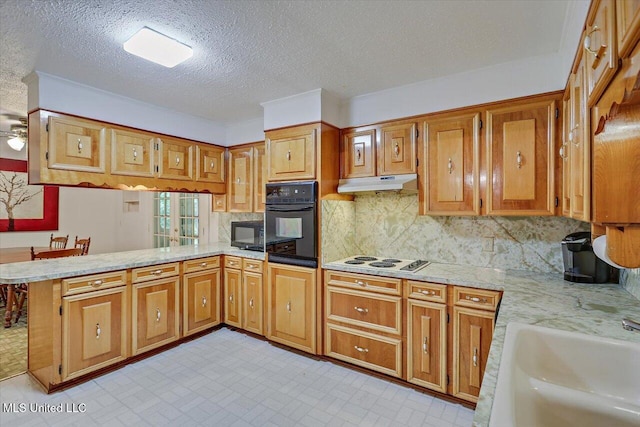 182 Brandon Williamsburg Rd, Mendenhall, MS 39114 - kitchen with black appliances, under cabinet range hood, a peninsula, decorative backsplash, and brown cabinetry