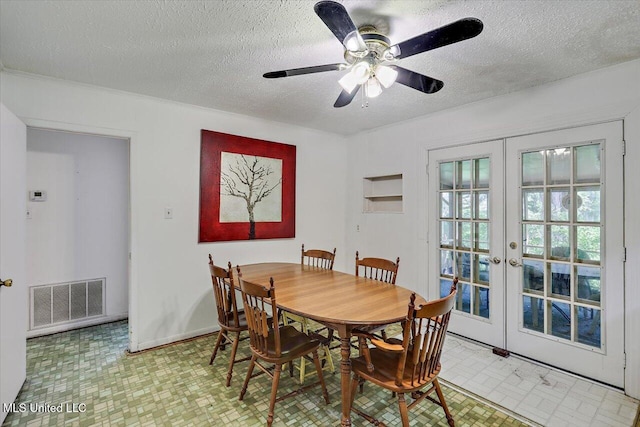 182 Brandon Williamsburg Rd, Mendenhall, MS 39114 - dining area featuring french doors, a textured ceiling, and ceiling fan