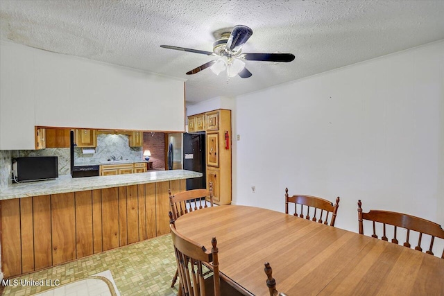 182 Brandon Williamsburg Rd, Mendenhall, MS 39114 - dining room featuring ceiling fan and a textured ceiling