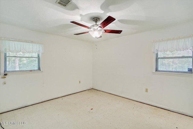 182 Brandon Williamsburg Rd, Mendenhall, MS 39114 - unfurnished room with plenty of natural light, tile patterned floors, and a ceiling fan