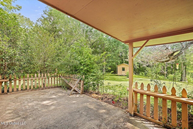 182 Brandon Williamsburg Rd, Mendenhall, MS 39114 - view of patio featuring a storage shed