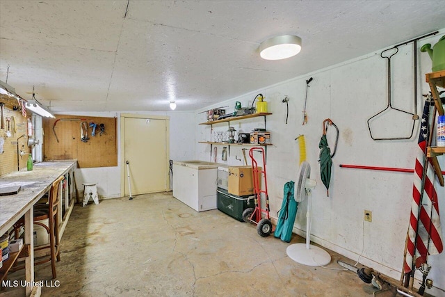 182 Brandon Williamsburg Rd, Mendenhall, MS 39114 - basement featuring a workshop area and a textured ceiling