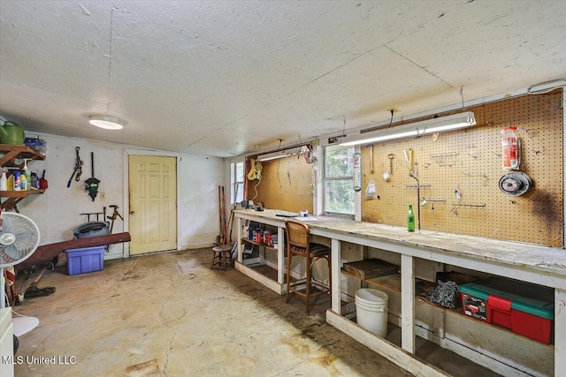 182 Brandon Williamsburg Rd, Mendenhall, MS 39114 - below grade area featuring a workshop area and a textured ceiling
