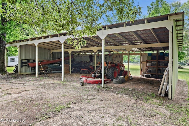 182 Brandon Williamsburg Rd, Mendenhall, MS 39114 - view of parking / parking lot featuring a pole building and a detached carport