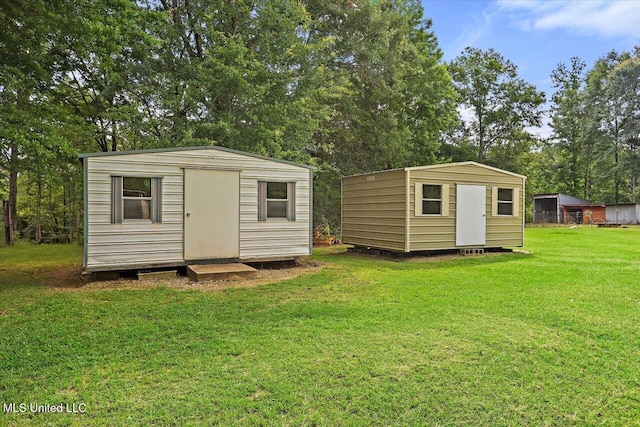 182 Brandon Williamsburg Rd, Mendenhall, MS 39114 - view of shed with view of wooded area